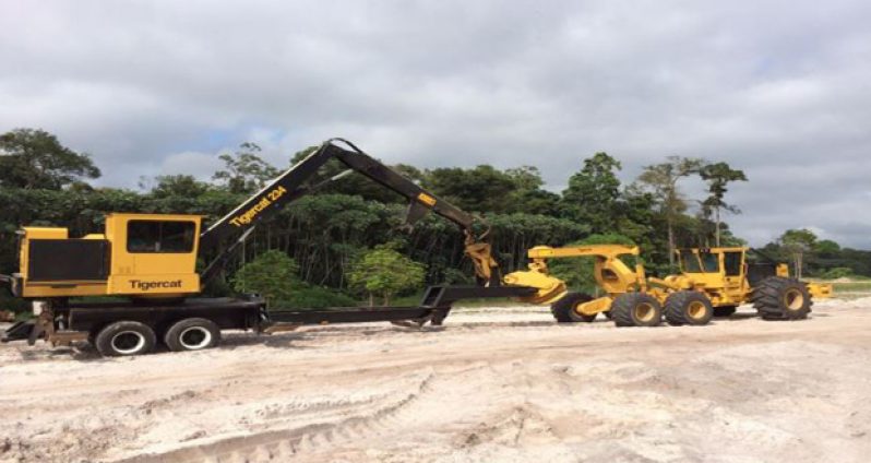 The Tigercat 234 Knuckleboom loader (left) and the Tigercat 635D Skidder (right)