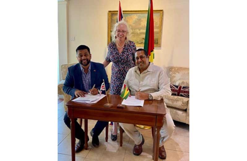 L – R: BritCham Chairman Faizal Khan and Iwokrama CEO, Dane Gobin along with British High Commissioner to Guyana, Amb Jane Miller at the signing ceremony