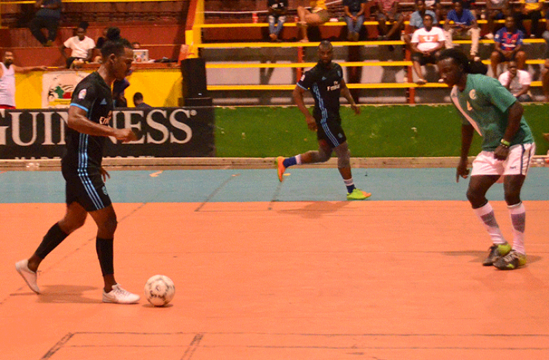 Sparta Boss' Gregory 'Jackie Chan' Richardson (with the ball) in full attacking mode during the Rio Indoor Championship at the National Gymnasium.