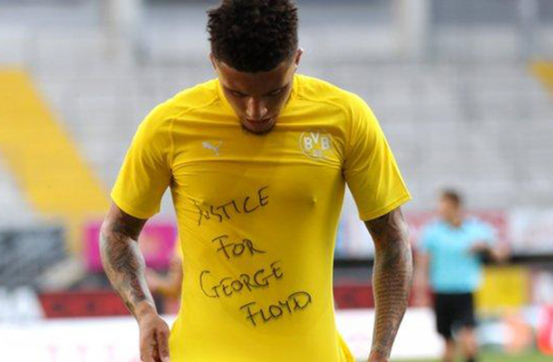 Jadon Sancho revealed a 'Justice for George Floyd' T-Shirt after scoring against Paderborn Germany’s Bundesliga at the weekend.