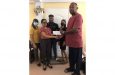 BCB President Hilbert Foster launches the Kris Jagdeo Construction Inc. tournament with representatives of the company