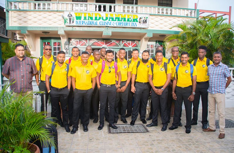 The Guyana Jaguars prior to their departure from the Windjammer hotel in Kitty. GCB’s Secretary Anand Sanasie (extreme right) and Treasurer Anand Kalladeen (extreme left) were on hand to wish the team every success. ( Delano Williams photo)
