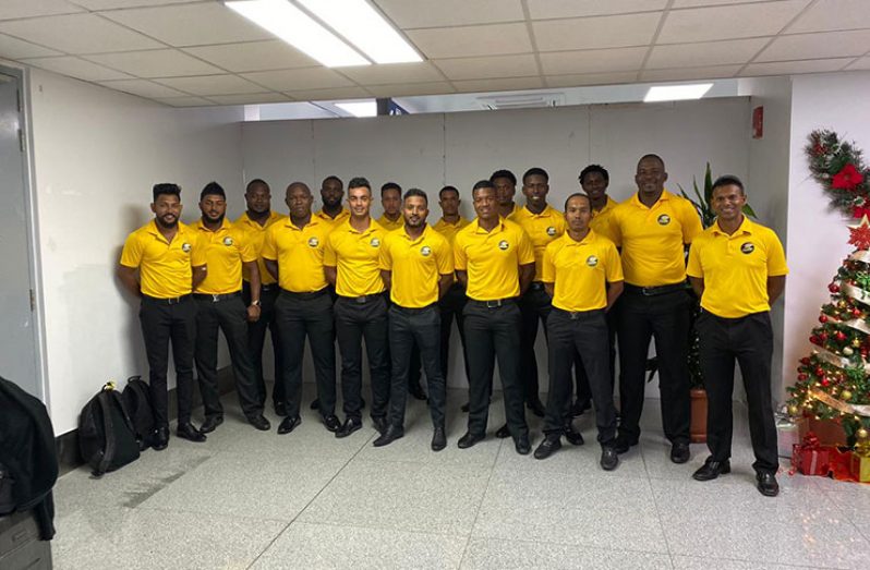 The defending Regional 4-Day champions, Guyana Jaguars and coaching staff, prior to winging out for Antigua yesterday morning.