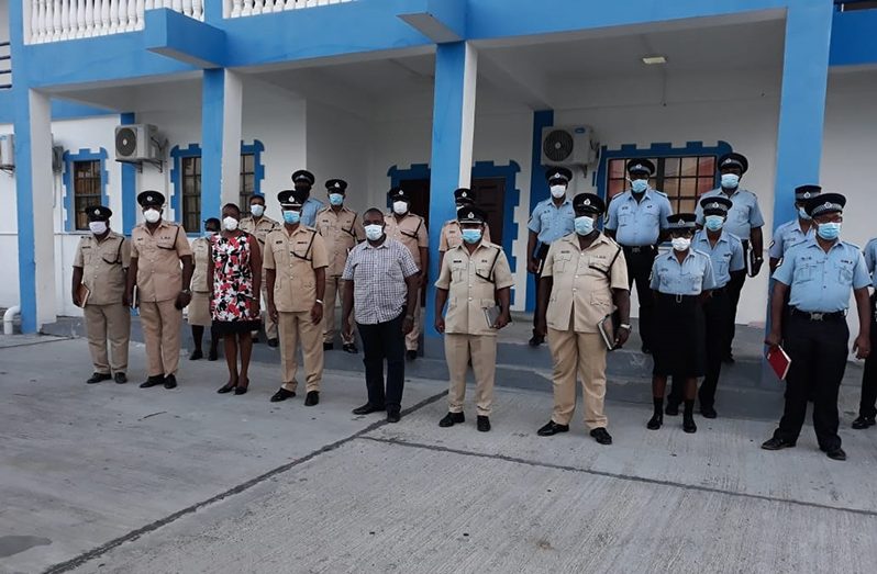 Commander Jairam Ramlakhan (fourth from left) with senior police administrators at the Central Police Station in New Amsterdam, hours after taking over the helm of Region Six division.
