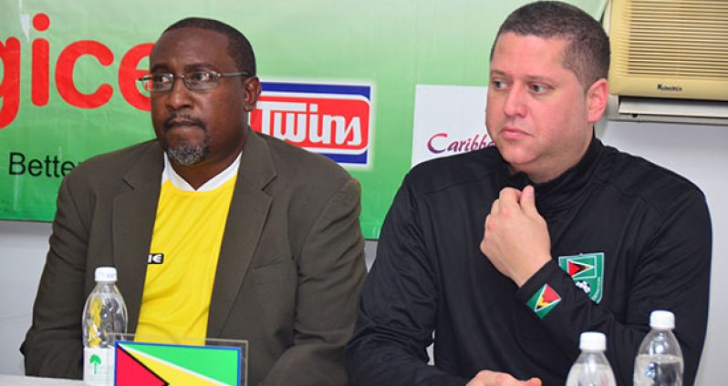 Jamaal Shabazz (left) and GFF Technical Director Claude Bolton (Adrian Narine photo)
