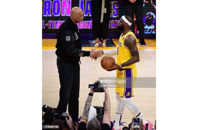 LeBron James #6 of the Los Angeles Lakers shakes hands with Kareem Abdul-Jabbar after breaking his all time scoring record of 38,388 points during the game against the Oklahoma City Thunder on February 7, 2023 at Crypto.Com Arena in Los Angeles, California.