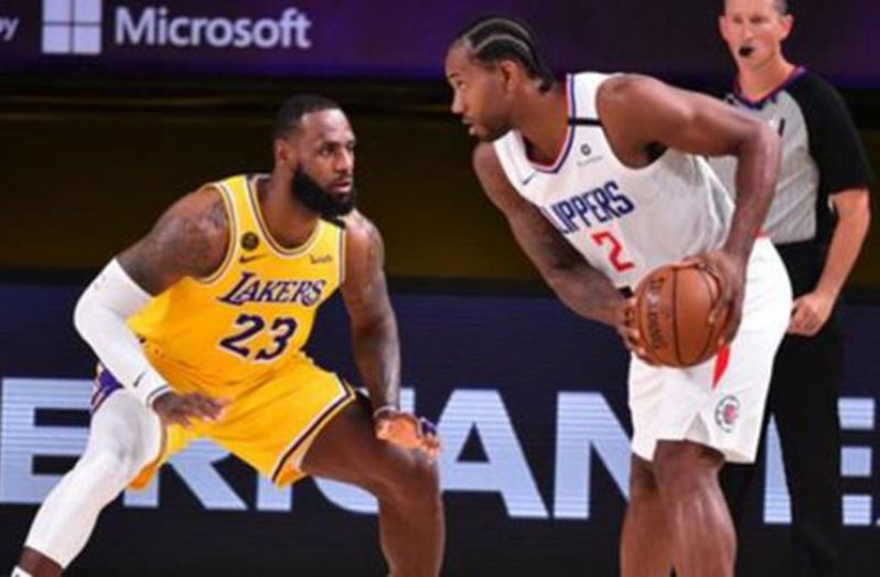 LeBron James (left) got the better of Kawhi Leonard and the Clippers when the action got under way.