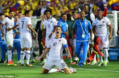 Colombia captain James Rodriguez celebrates after scoring his country's second goal against Paraguay