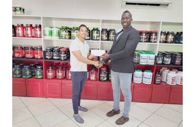 Fitness Express’ Jamie McDonald hands over sponsorship to GAPLF’s Paul Meusa