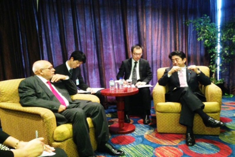 President Donald Ramotar and Prime Minister of Japan Shinzo Abe during a bilateral meeting in Trinidad and Tobago yesterday