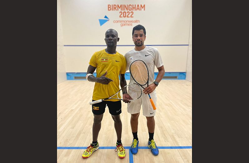 Guyana's Jason-Ray Khalil (R) after his match against Paul Kadoma of Uganda at the 2022 Commonwealth Games