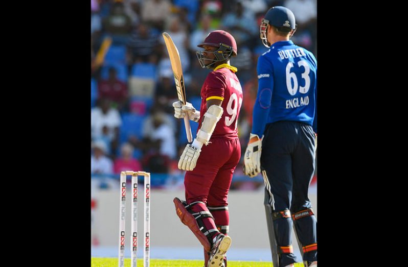 Jason Mohammed celebrates his maiden half-century in ODIs during Friday’s opening game against England. (Photo courtesy WICB Media)