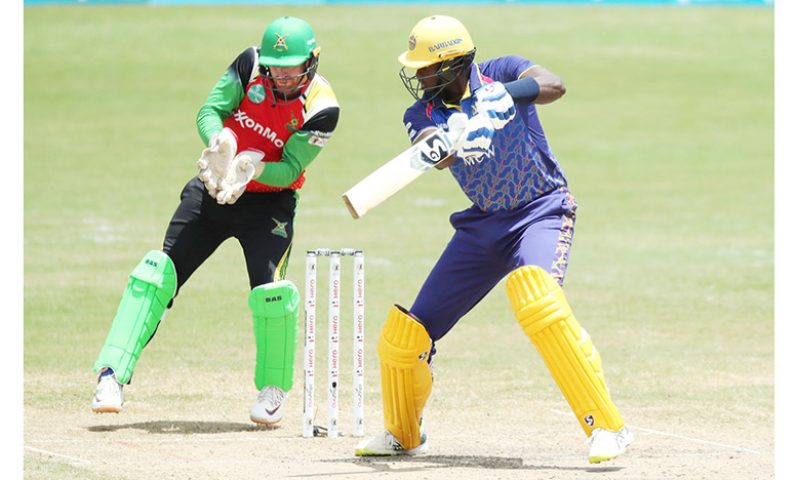 Jason Holder plays through the off-side during his unbeaten 40 against Guyana Amazon Warriors. (Photo courtesy Getty/CPL)