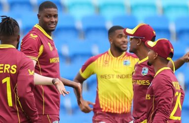 Jason Holder celebrates with his team – mates