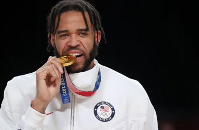 JaVale McGee poses with his gold medal.