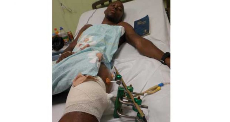 Flashback: The injured Jesse Gibbs as he awaits a second surgery