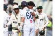 England's Joe Root (centre) hugs Pakistan's Razaullah at the end of the third Test (Photo: AFP)