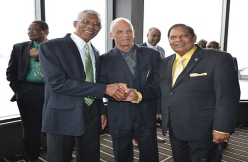Flashback- Dr. Joey Jagan (centre) sharing a moment with President David Granger and Prime Minister Moses Nagamootoo
