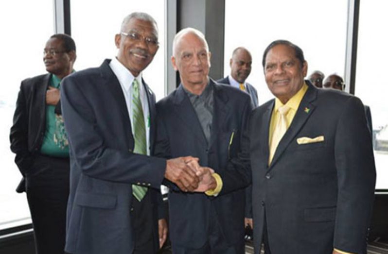 Cheddi Joey Jagan (centre) with President David Granger and Prime Minister Moses Nagamootoo