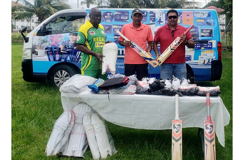 Regal’s Ian John, along with owner and Managing Director of Regal Stationery and Computer Centre, Mahendra Hardyal and Anil Beharry at the presentation ceremony.