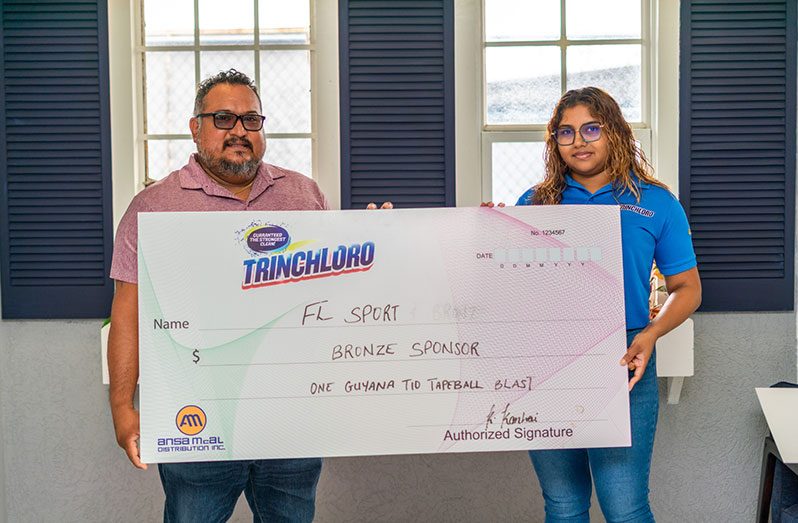 Tournament Director, John Ramsingh (left) and Kristina Kanhai, Brand Manager for Trinchloro Bleach