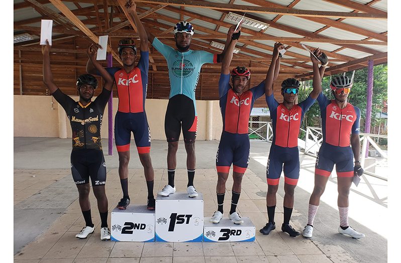 Top six finishers with Briton John at the top of the podium (cycling 1)