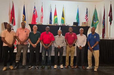 WICUA President Vivian Johnson, fourth from left, poses with members of his executive