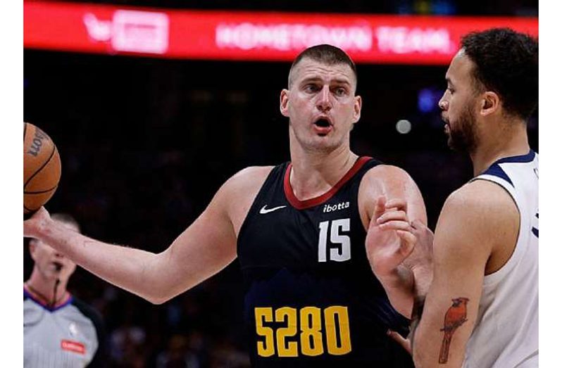 NBA: Nikola Jokic leads Nuggets to victory over Timberwolves.