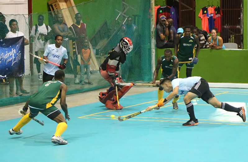 Queen’s Park Jordan Vieira scores on night two of the Diamond Mineral Water Indoor Hockey Festival.