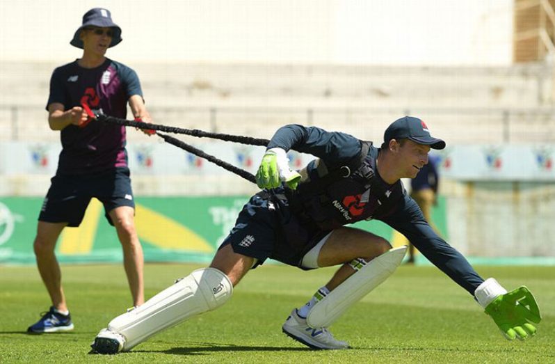 Jos Buttler practises his glove-work at England training session. (Getty Images)