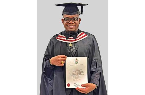 Attorney at Law, Joshua Benn with his Master of Laws (LL.M.) in Oil, Gas, and Renewable Energy Law certificate obtained from Swansea University in the United Kingdom