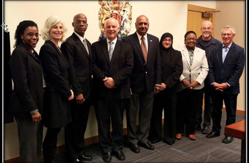 Left to right: JES Guyana Country Representative Rolinda Kirton, JES Guyana Project Manager Evelyn Neaman, Justice Reynolds, Chief Judge Crabtree, Chancellor Carl Singh,Director of Public Prosecutions,Shalimar Ali-Hack, Chief Magistrate McLennan, Vancouver lawyer Chris Johnson, and Judge Michael Hicks (retired)