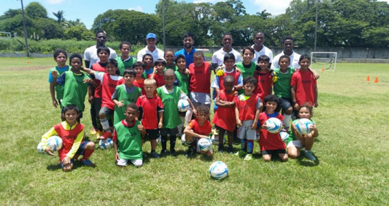 Junior Jags summer camp students pose with their coaches.