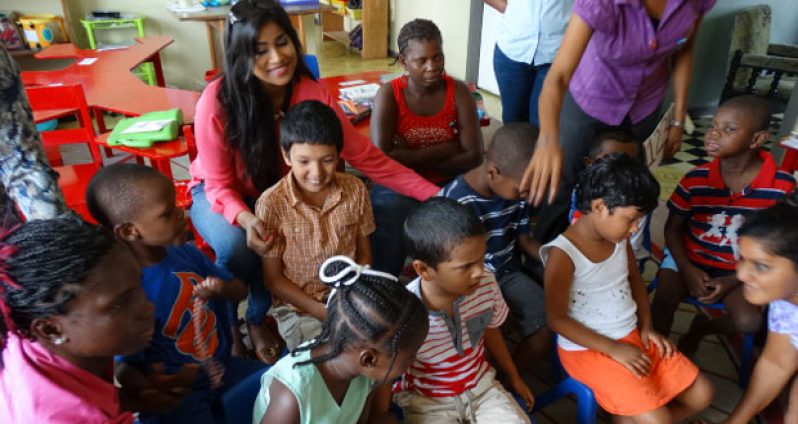 Katherina interacting with autistic children in Guyana