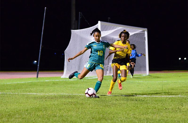Kiana Khedoo (#10) had an impressive game and capped her performance with a beautiful goal in the 60th minute to help Guyana defeat Antigua and Barbuda 2-0. (Samuel Maughn photo)