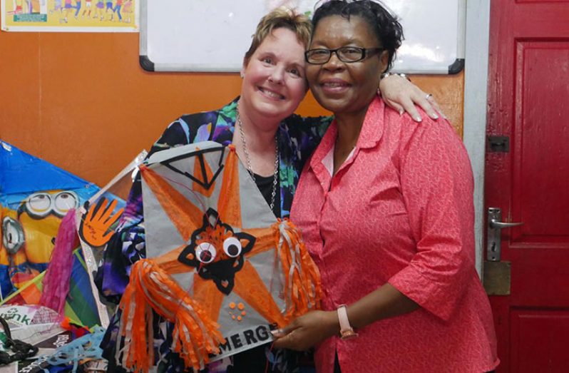 Emerge BPO Services Inc. Chief Executive Officer Heidi Solomon-Orlick (right) and Administrator of the Sophia Care Centre, Roxanne Blenman share a light moment.