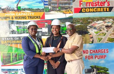 Secretary to the General Manager, Ms. Sherisha Adams, hands over sponsorship cheque to Organiser Colin Aaron in the presence of General Manager, Ms. Akiesha Forrester