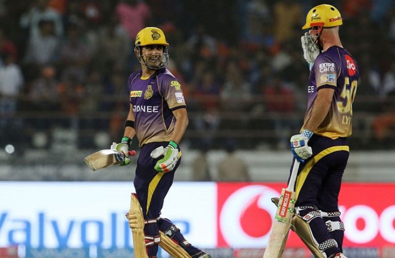 Gautam Gambhir smiles towards Chris Lynn after Kolkata Knight Riders' ten-wicket victory in their match against Gujarat Lions.