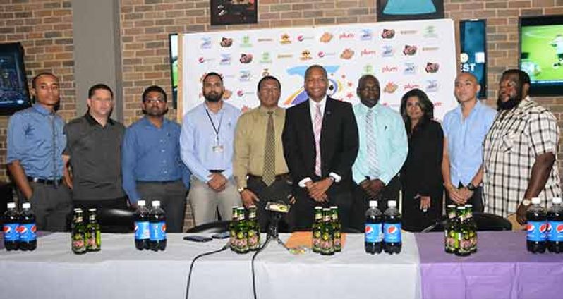 Kashif and Shanghai Organisation joins by sponsors and members of the GFF Normalisation Committee at their launch at 704 Sports Bar yesterday.