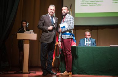 Kiefer Bacchus being presented with his certificate from the People’s Friendship University of Russia