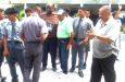 Alvin Kallicharran mingles with the students on the school’s tarmac as they have  their books signed.