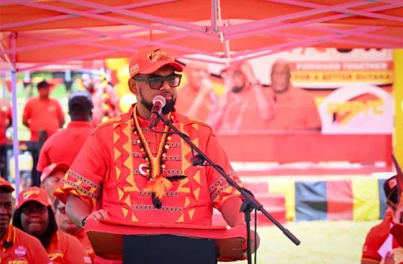 President Dr. Irfaan Ali addressing residents of Kamarang (DPI photo)