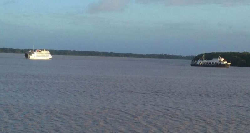 The MV Malali (at right)  shortly after arriving to assist the MV Kanawan (at left), while the latter developed mechanical problems on Sunday
