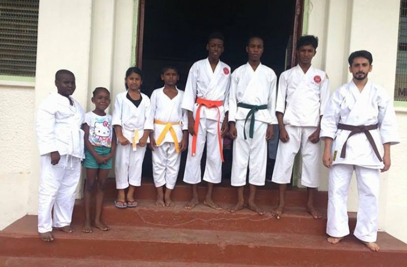 Linden karate students with their facilitator, Maqsood Mansoor