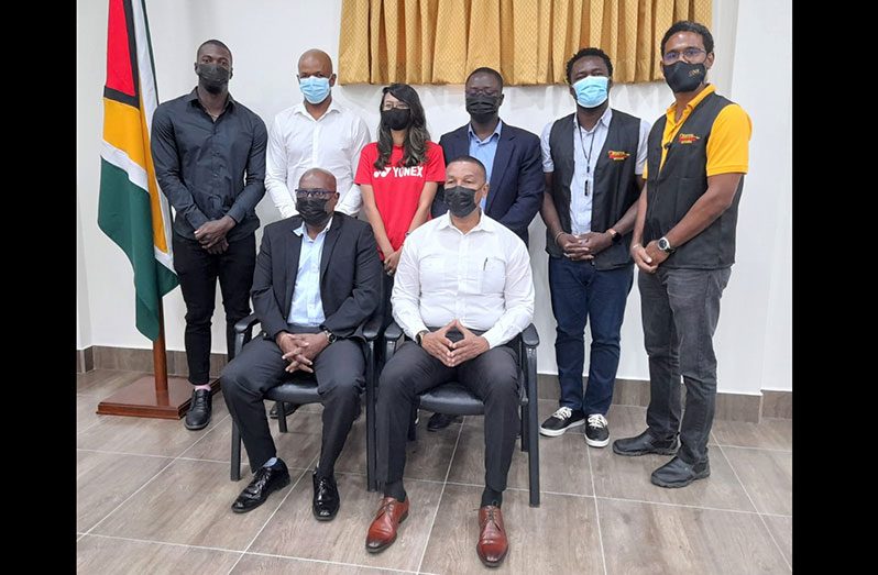 Seated: Director of Sport, Steve Ninvalle, and NSC Chairman Kashif Muhammad, along with the associations and athletes who benefitted