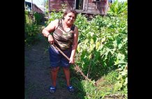 Kavita Abdool tending to her crops