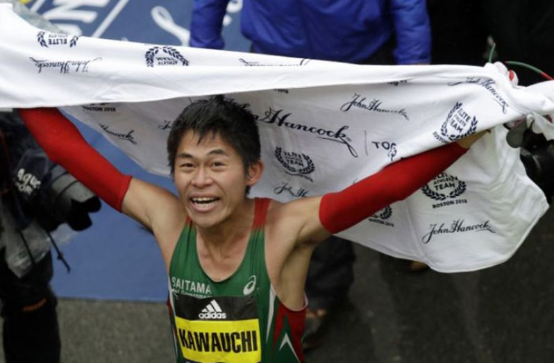 Japan’s Yuki Kawauchi ran down defending champion Geoffrey Kirui of Kenya to win in two hours 15 minutes. (Yahoo Sport)