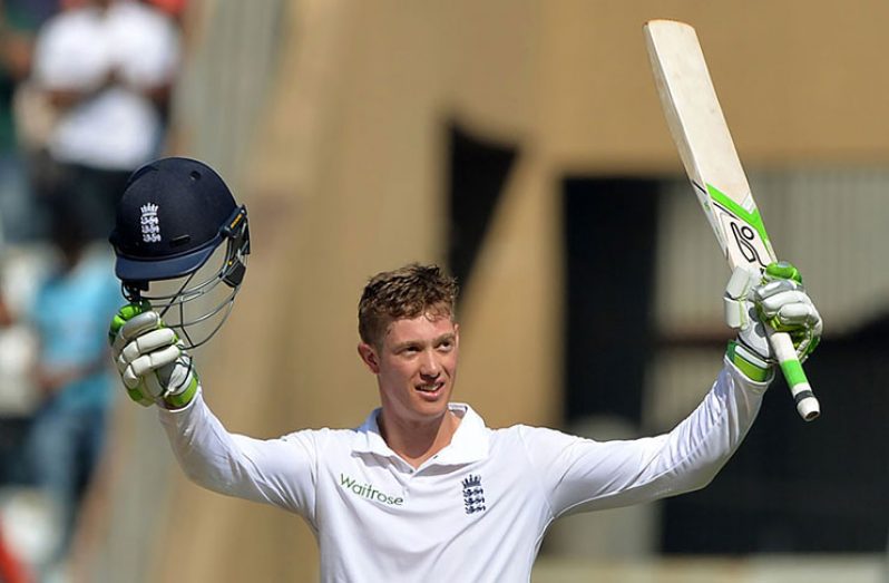 Keaton Jennings celebrates his hundred on Test debut.