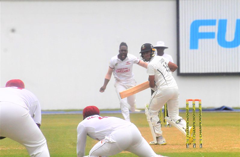 Kemol Savory looks back to see the ‘keeper’ taking the catch off Louis yesterday (Sean Devers photo)