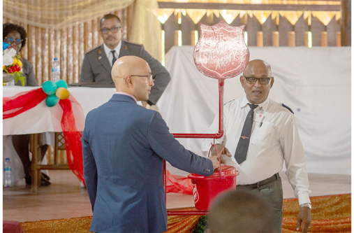 Kettle 1 Nicholas Boyer makes the first donation as part of the Salvation Army’s Christmas appeal (Delano Williams photos)